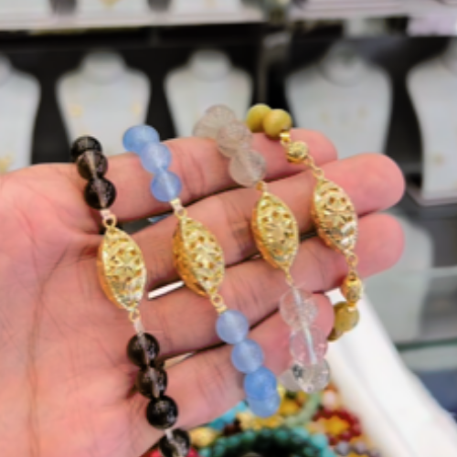 Albahaa. Natural stone Gold design Bracelet of different stone colors.