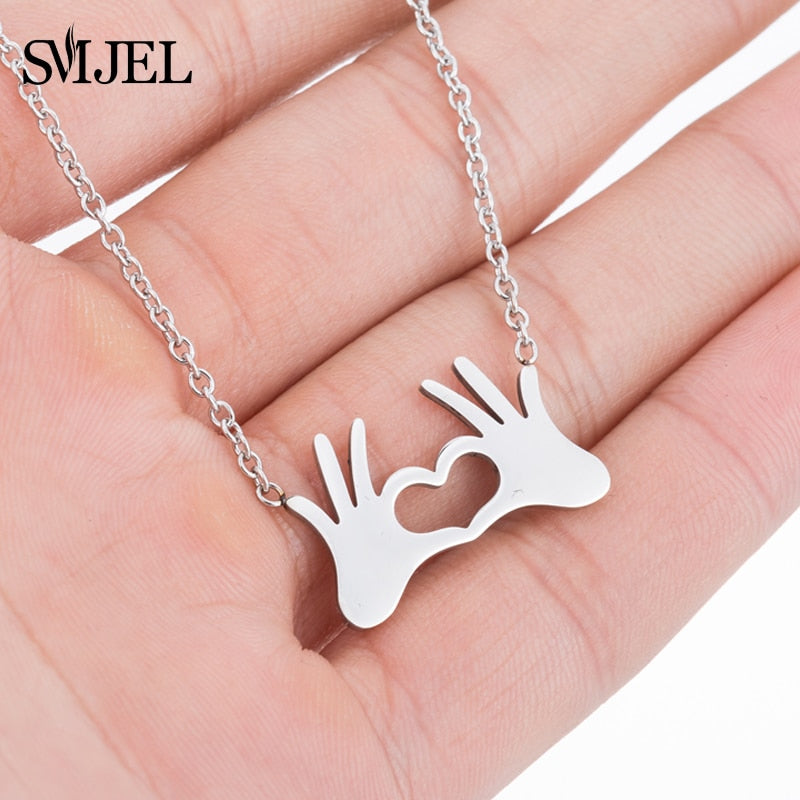 SMJEL Stainless Steel Charm Necklace Fashion Jewelry Hand Love Heart Gesture Necklace Pendant for Women Gift Best friends bijoux