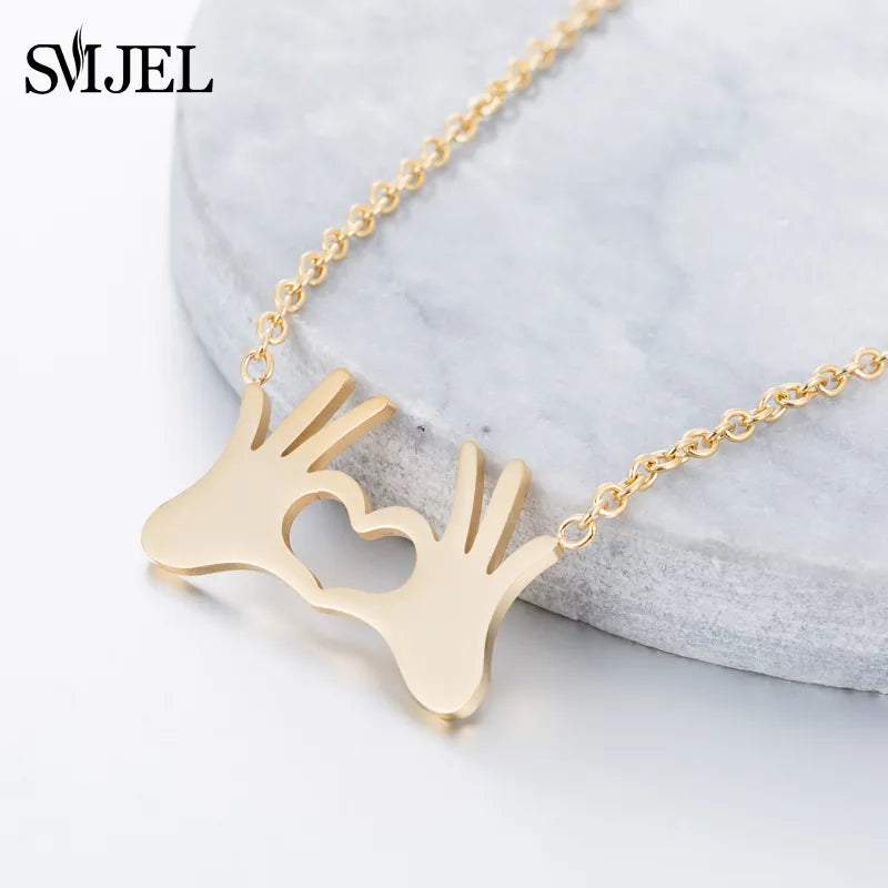 SMJEL Stainless Steel Charm Necklace Fashion Jewelry Hand Love Heart Gesture Necklace Pendant for Women Gift Best friends bijoux