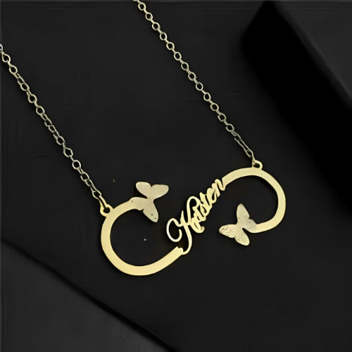 INFINITY PERSONALIZED NAME PENDANT DECORATED WITH BUTTERFLY DESIGN.