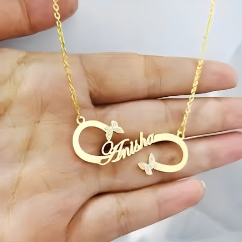 INFINITY PERSONALIZED NAME PENDANT DECORATED WITH BUTTERFLY DESIGN.