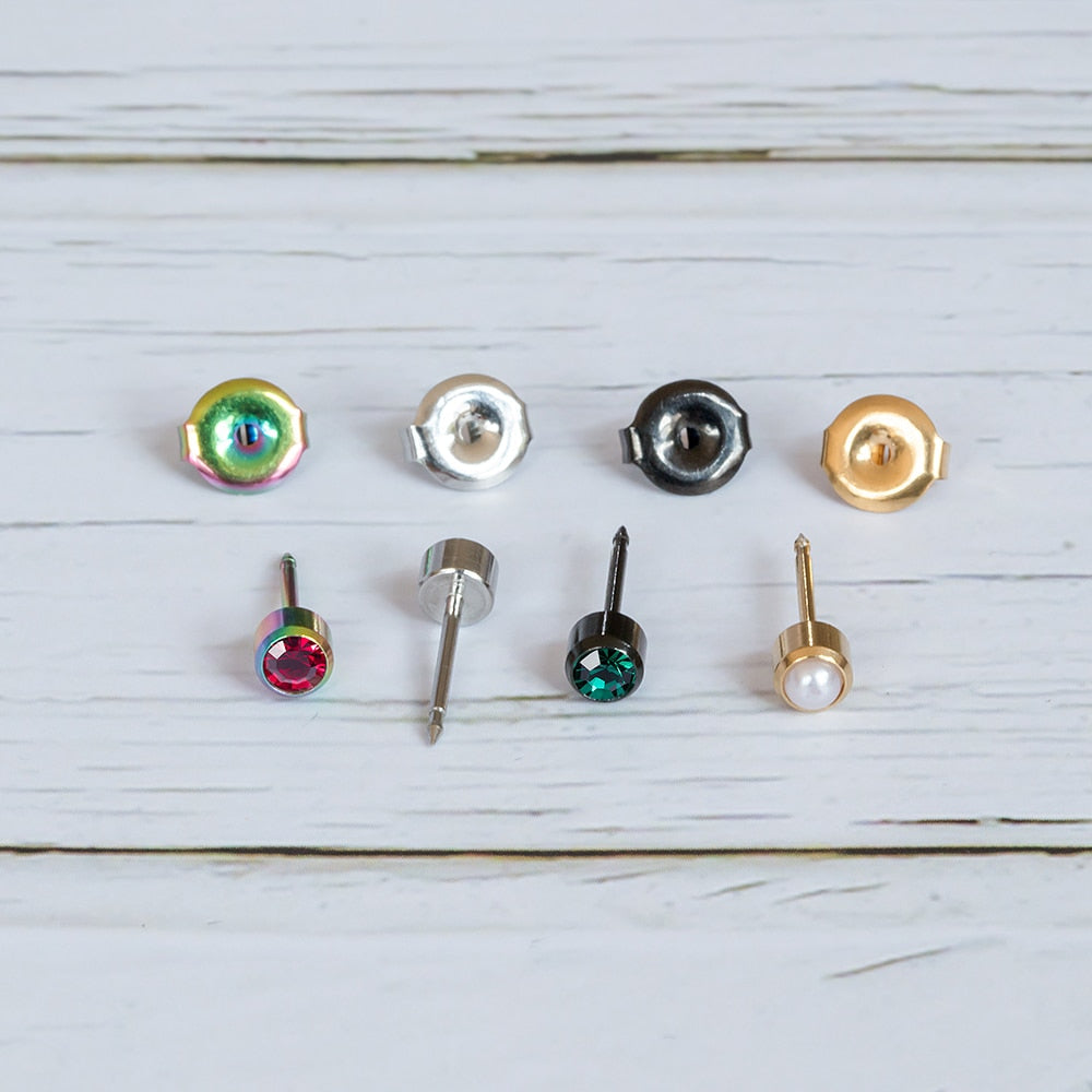 One pair of Birthstone stud earrings made of surgical steel for ear piercing gun.