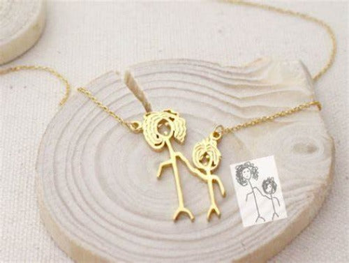 AALIA JEWELRIES Customize your child's artwork into a unique silver or gold pendant, necklace, or bracelet. Turn your kid's drawing into a precious keepsake according to your order.